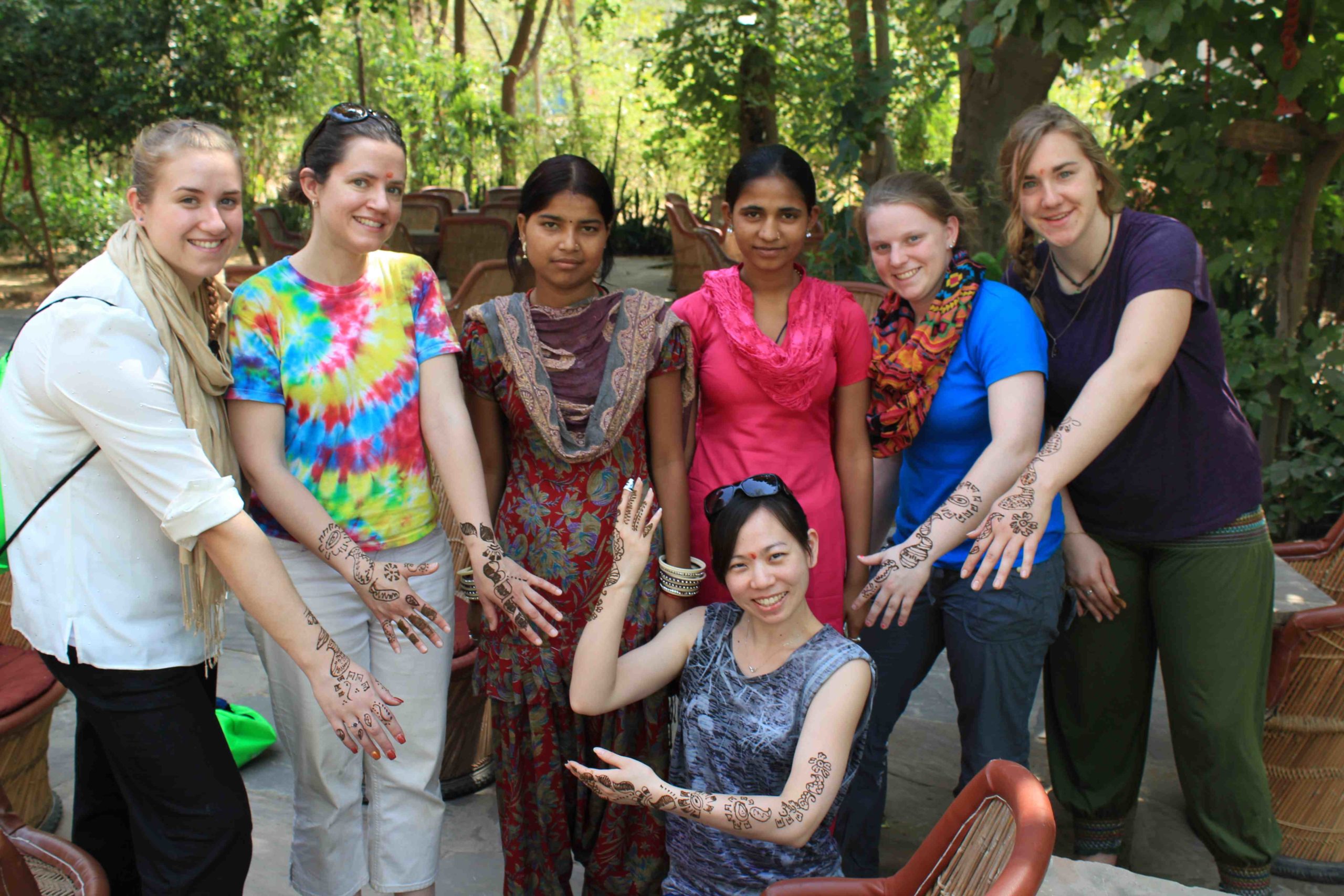 Students show off their henna tattoos during a Study Away trip to India