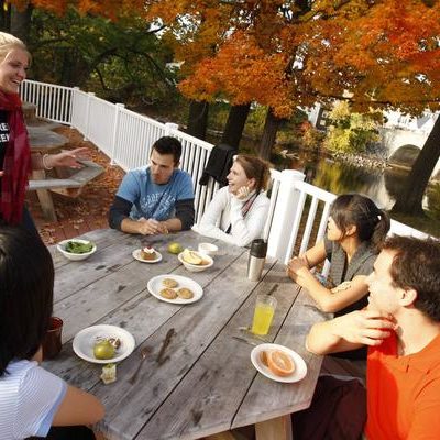 Students on the patios of Gilmore Dining Hall in Henniker