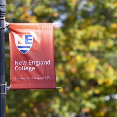NEC Banner on the Henniker campus