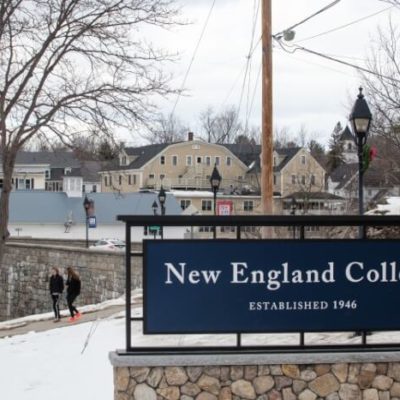 Main NEC sign on Henniker campus