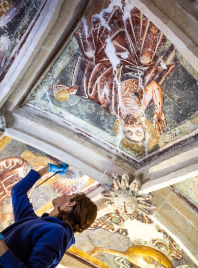 Artist restores painted ceiling