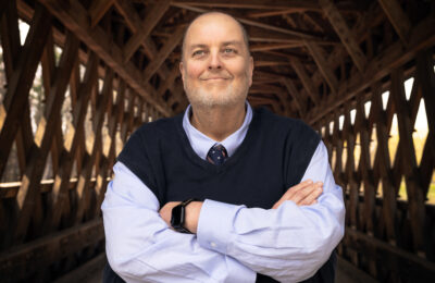 Dr. Wayne F. Lesperance, Jr., President of New England College