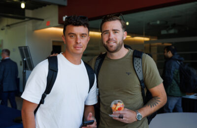 Two male executive MBA students during New England College's summer 2024 residency.