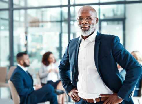 Male business administration professional in an office environment