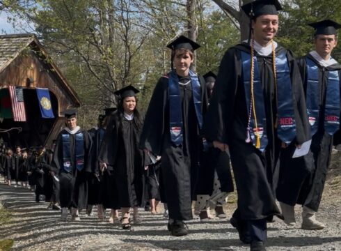 Students proceed into the Commencement ceremony at New England College on May 2, 2025.