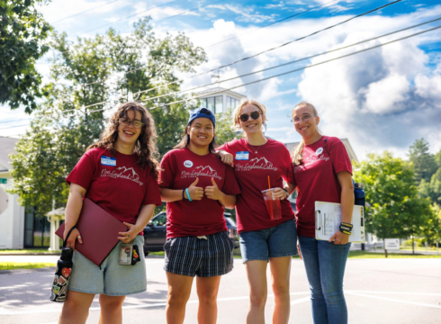 Photo of students welcoming incoming students to New England College
