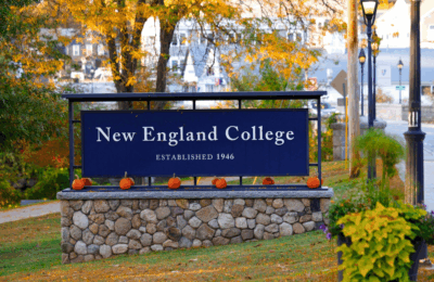 Campus sign with pumpkins during Fall Festival 2025