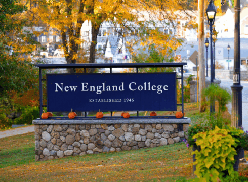 Campus sign with pumpkins during Fall Festival 2025