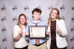 Professor Colleen McElveen and students Soob Soobitsky and Lauren Hall attend the 2026 New England Newspaper & Press Association awards on March 14.