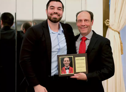 Assistant Director of Athletics Geoffrey Hassard receives the Pete Nevins Award for Distinguished Service by the Eastern Athletic Communications Association – EAST-COMM (formerly ECAC-SIDA).