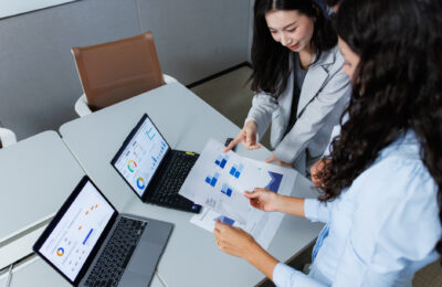 Market research analysts review customer data.